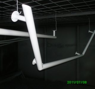 Hand rails, weld brackets and cure in oven